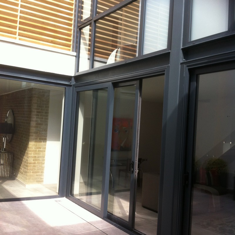 Anthracite aluminium sliding patio doors fitted in Welwyn Garden City