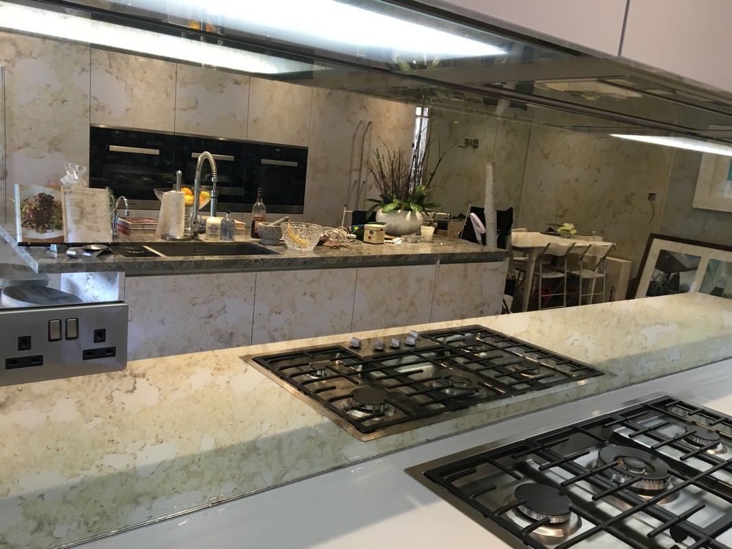 Mirror glass splashback in Welwyn Garden City luxury kitchen