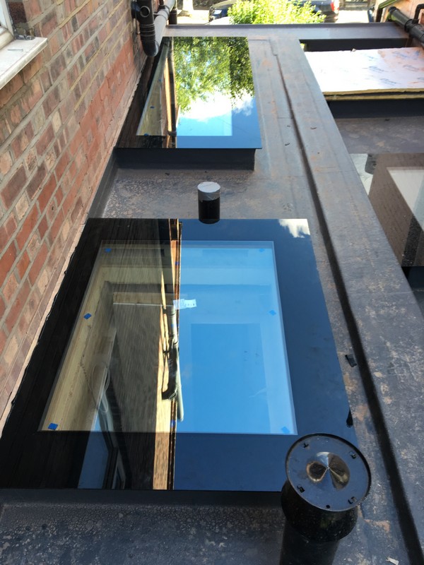 Multiple flat roof skylights on extension in Welwyn Garden City